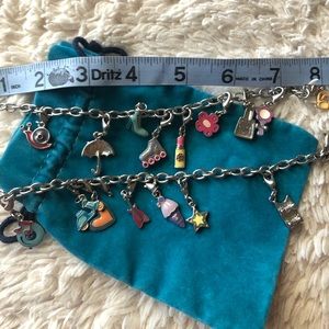 2 silver bracelets with 15 charms.